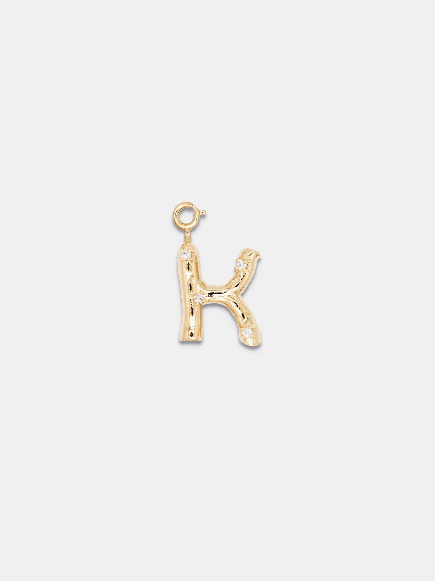 K (gold)